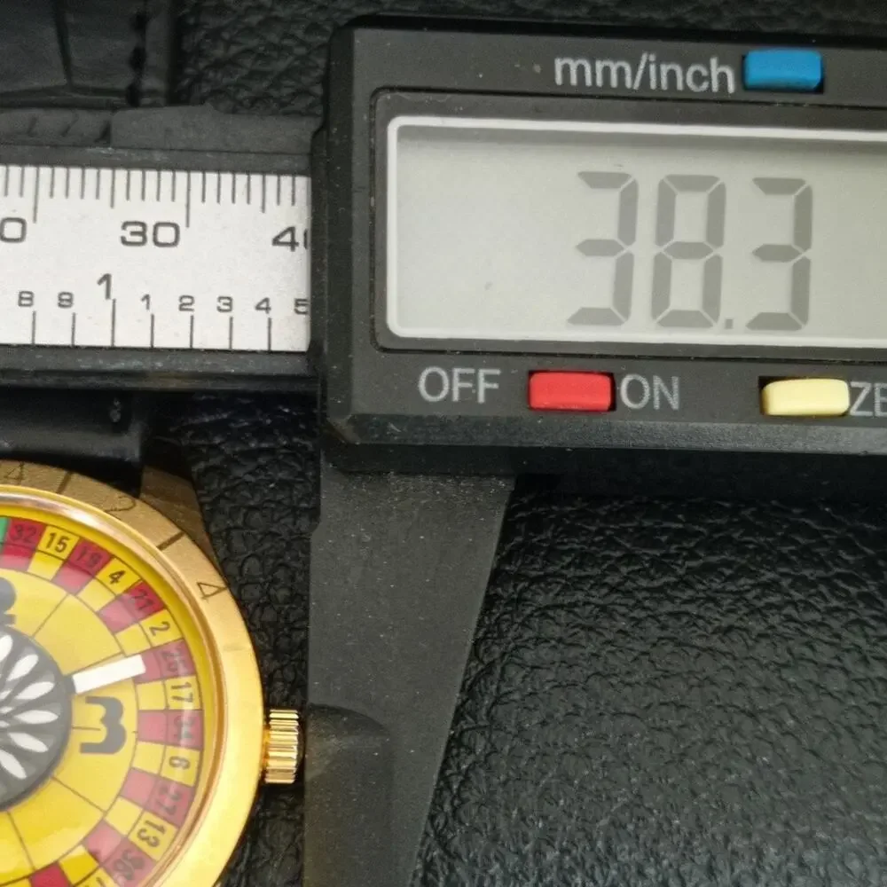 Vintage 1973 Roulette Manual Mens Gold Watch W/Leather Strap & Yellow accents